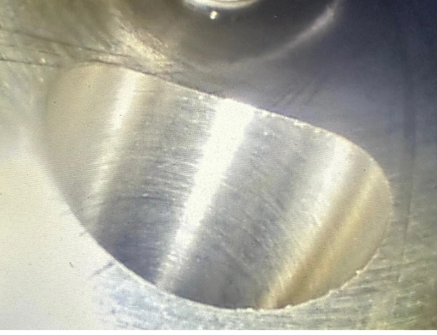 Close-up of burr before UFIBER deburring